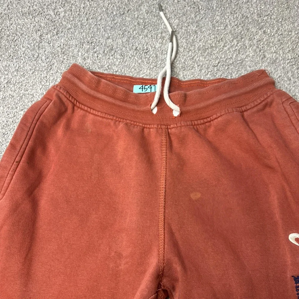 True Religion Rust Orange Sweatpants with White Logo
